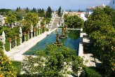 This is the raised tank of the Crown Pool, at the centre of this famous garden. It contains three fountains, formed from twisted stone columns topped by stone crowns. The pool is surrounded by orange trees, which have been a vital element of the Portuguese garden ever since the Muslim settlers made medieval, Islamic gardens across the Iberian peninsula. The Portuguese are sometimes credited with bringing the first sweet oranges to Europe from India or the Far East.