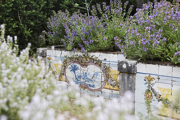 Part of the herb garden at the Palace of Queluz - a quiet and lesser known corner of the garden. The old azuleijos are faded and chipped, but the garden has real charm.