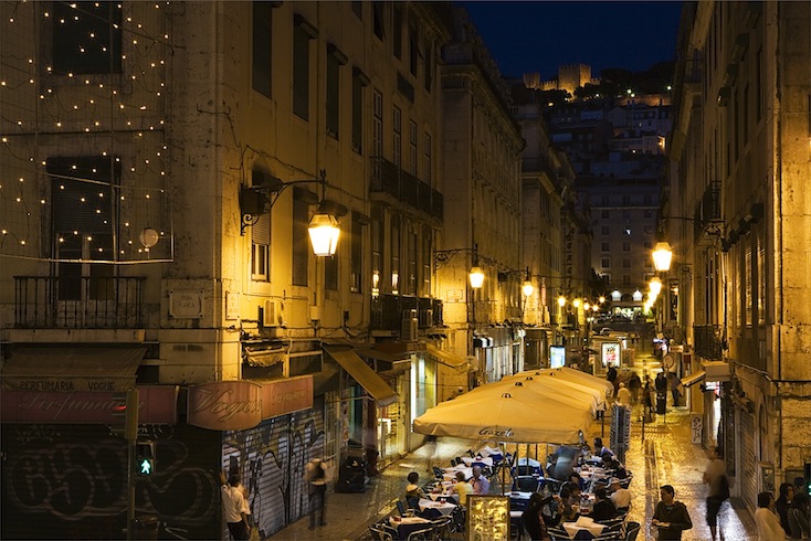 Evening in the Baixa district, looking up to the Castelo de São Jorge Evening in the Baixa district, looking up to the Castelo de São Jorge