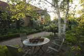 Late afternoon in Sandhill Farm House garden, home of renowned garden designer Rosemary Alexander